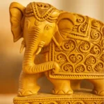 image of wooden elephant idol in kadam wood by kaarigar handicraft made by skilled artisans or karigar